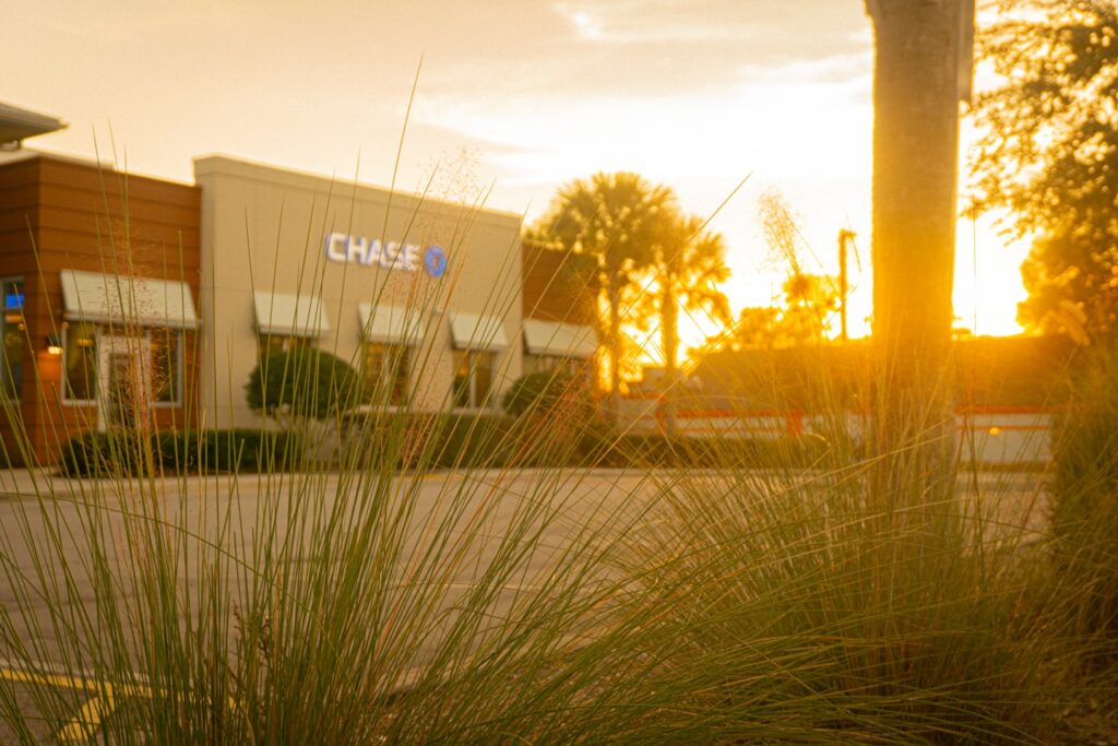 Chase bank building at sunset with warm light.